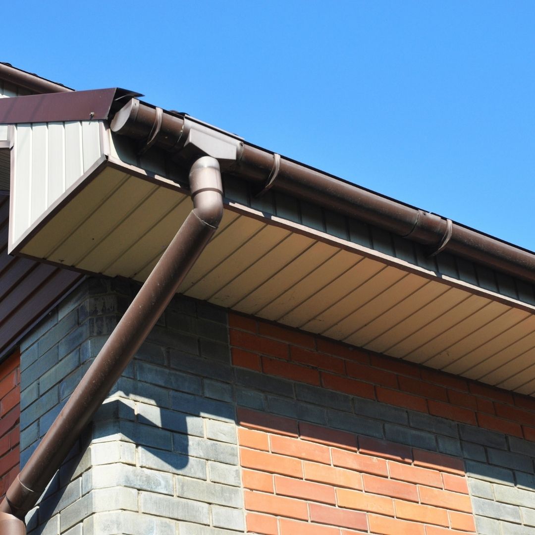 house with gutters and downspout