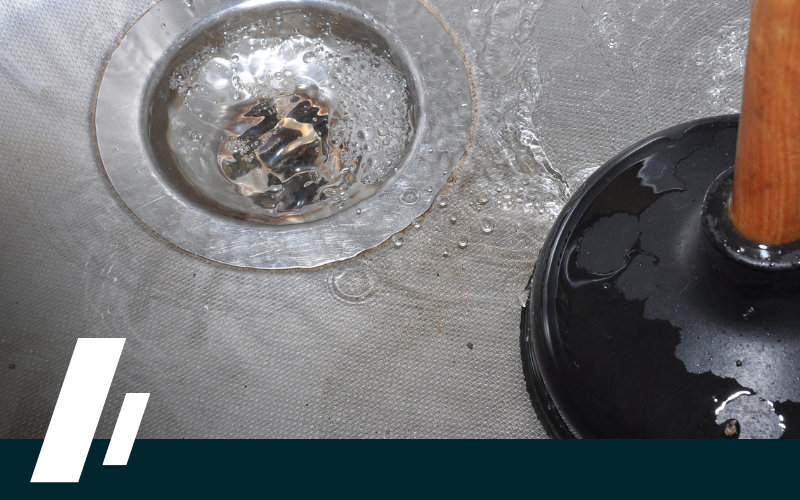 Using a plunger to unclog sink