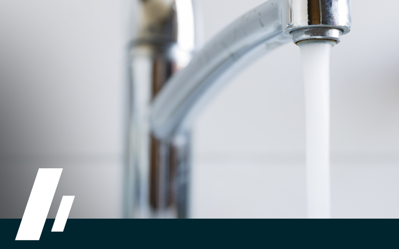 A faucet with water running